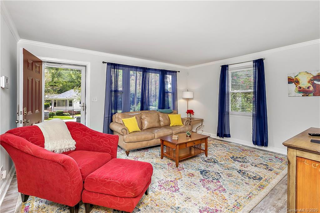 2320 Vanderbilt Road Charlotte, NC 28206 - Photo 2 of 11 a living room with furniture and a window