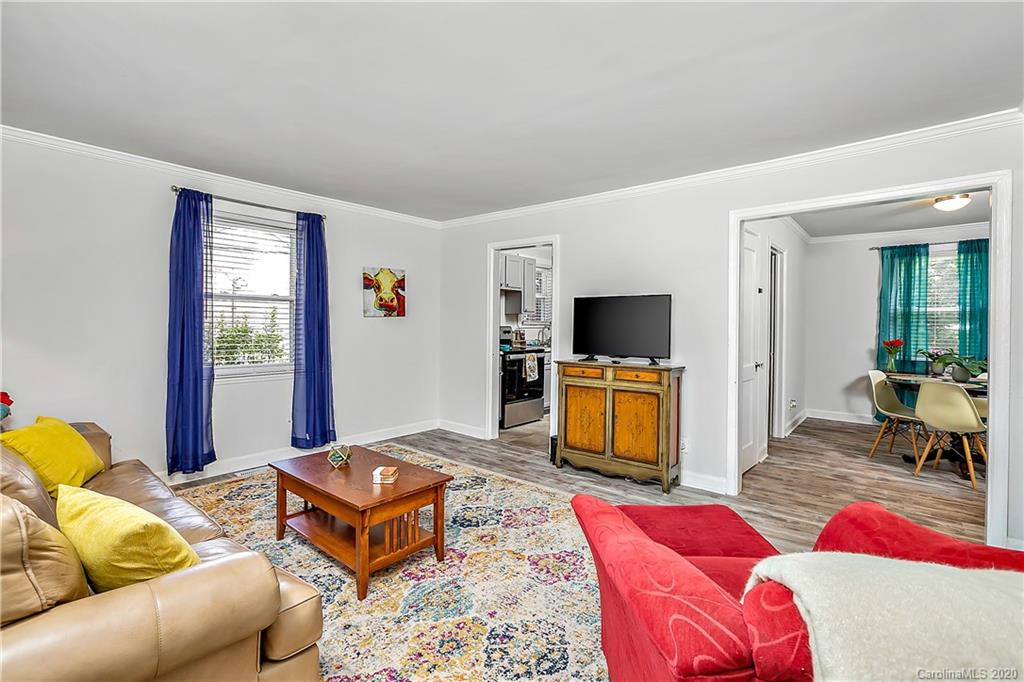 2320 Vanderbilt Road Charlotte, NC 28206 - Photo 3 of 11 a living room with furniture and a flat screen tv