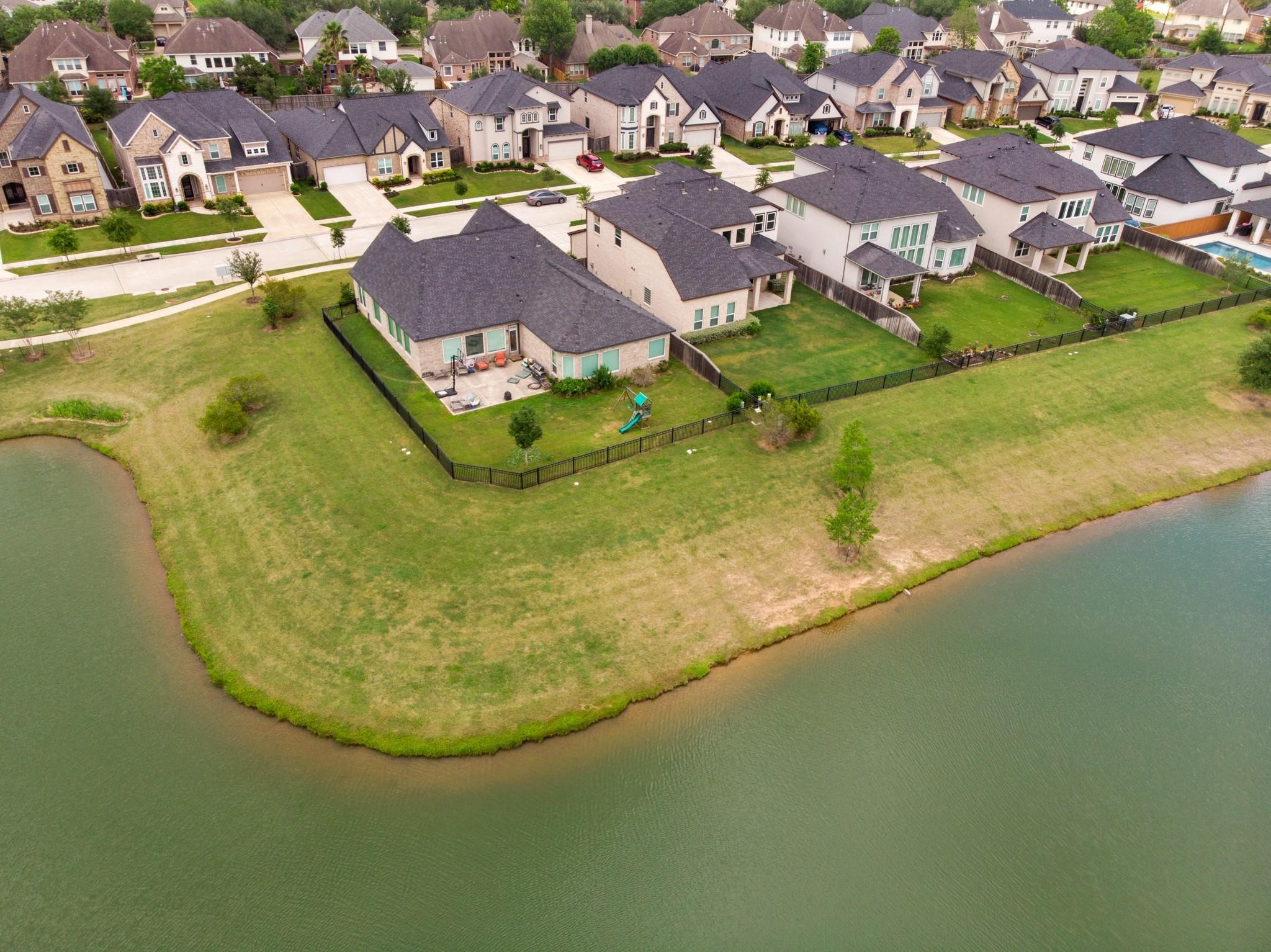 4227 Carol Ridge Drive Sugar Land, TX 77479 - Photo 34 of 35 an aerial view of residential houses with outdoor space