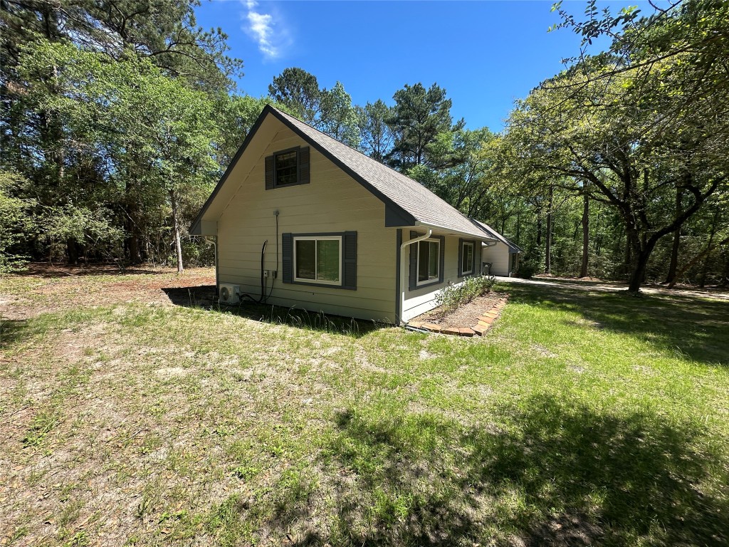 9239 Walnut Road Plantersville, TX 77363 - Photo 2 of 17