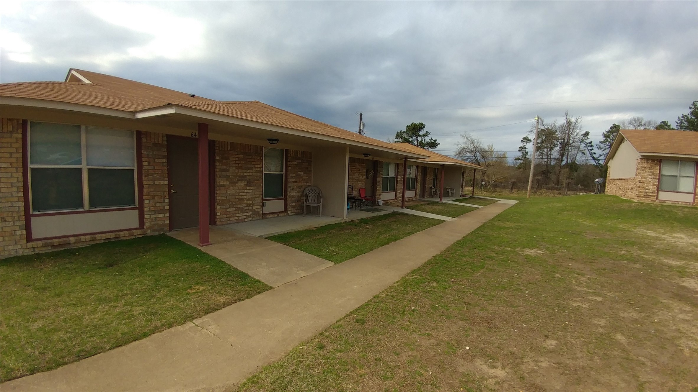 1300 Courtland Road Atlanta, TX 75551 - Photo 2 of 7 swimming pool with an outdoor seating