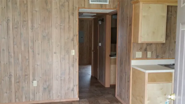 a view of a bathroom from a hallway