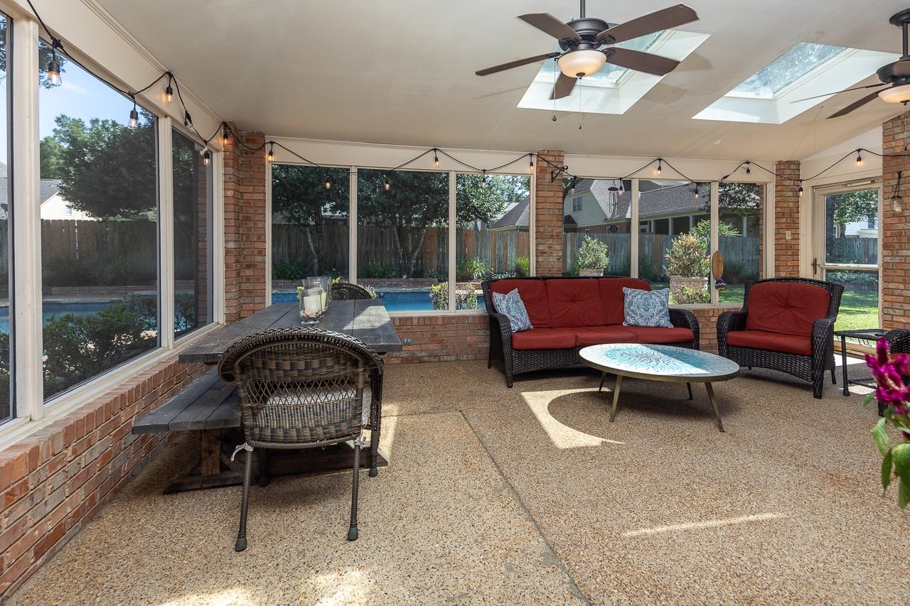 9637 Spring Meade Lane Germantown, TN 38139 - Photo 23 of 25 a outdoor space with patio the couches and a dining table with garden view