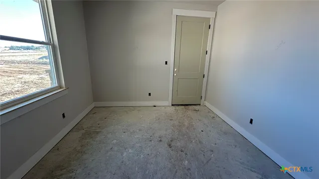 a view of backyard of the house