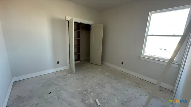 an empty room with a window