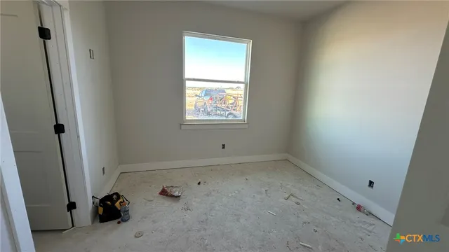 an empty room with windows