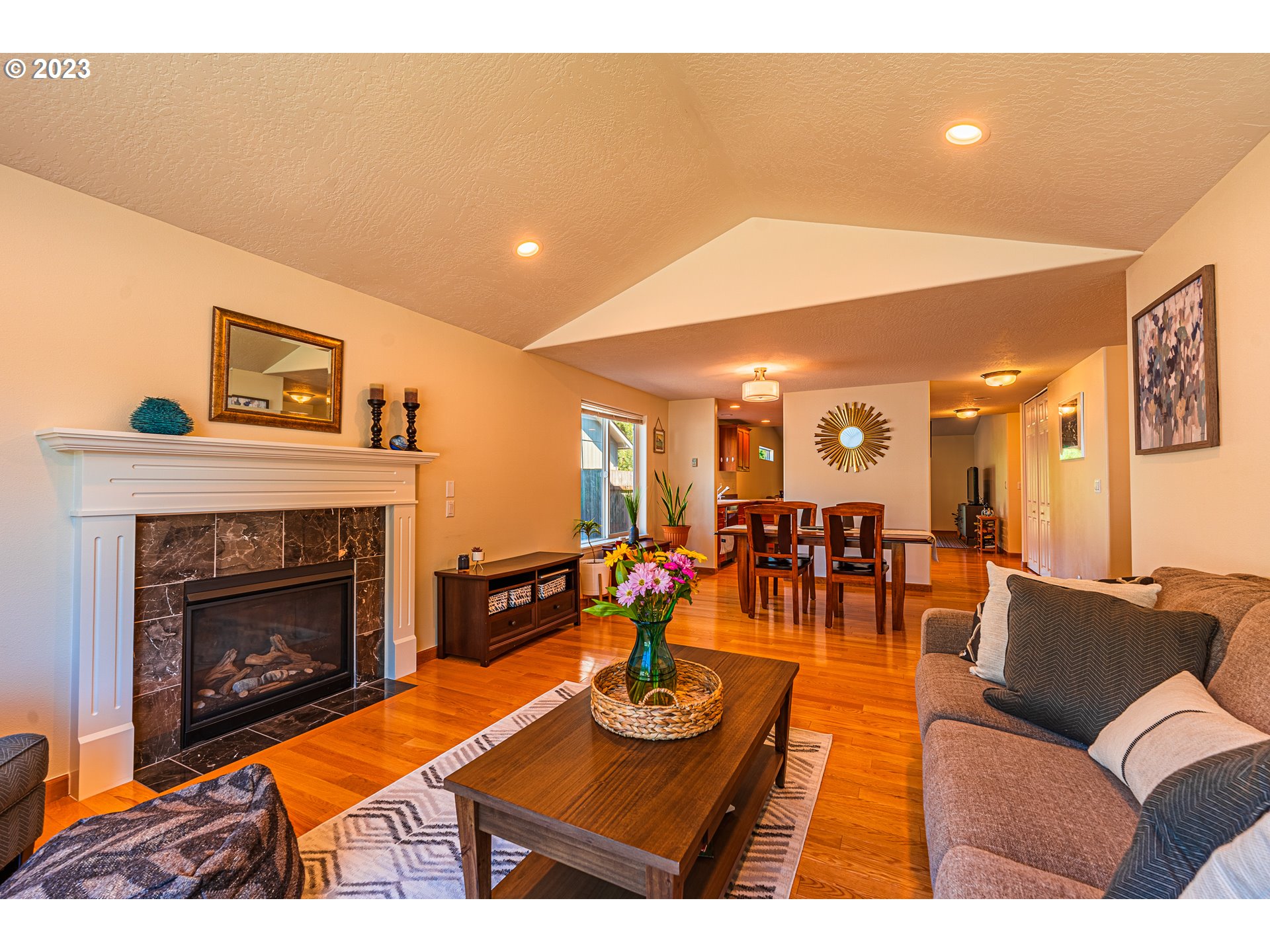 4241 Cole Way Springfield, OR 97478 - Photo 8 of 41 a living room with furniture and a fireplace