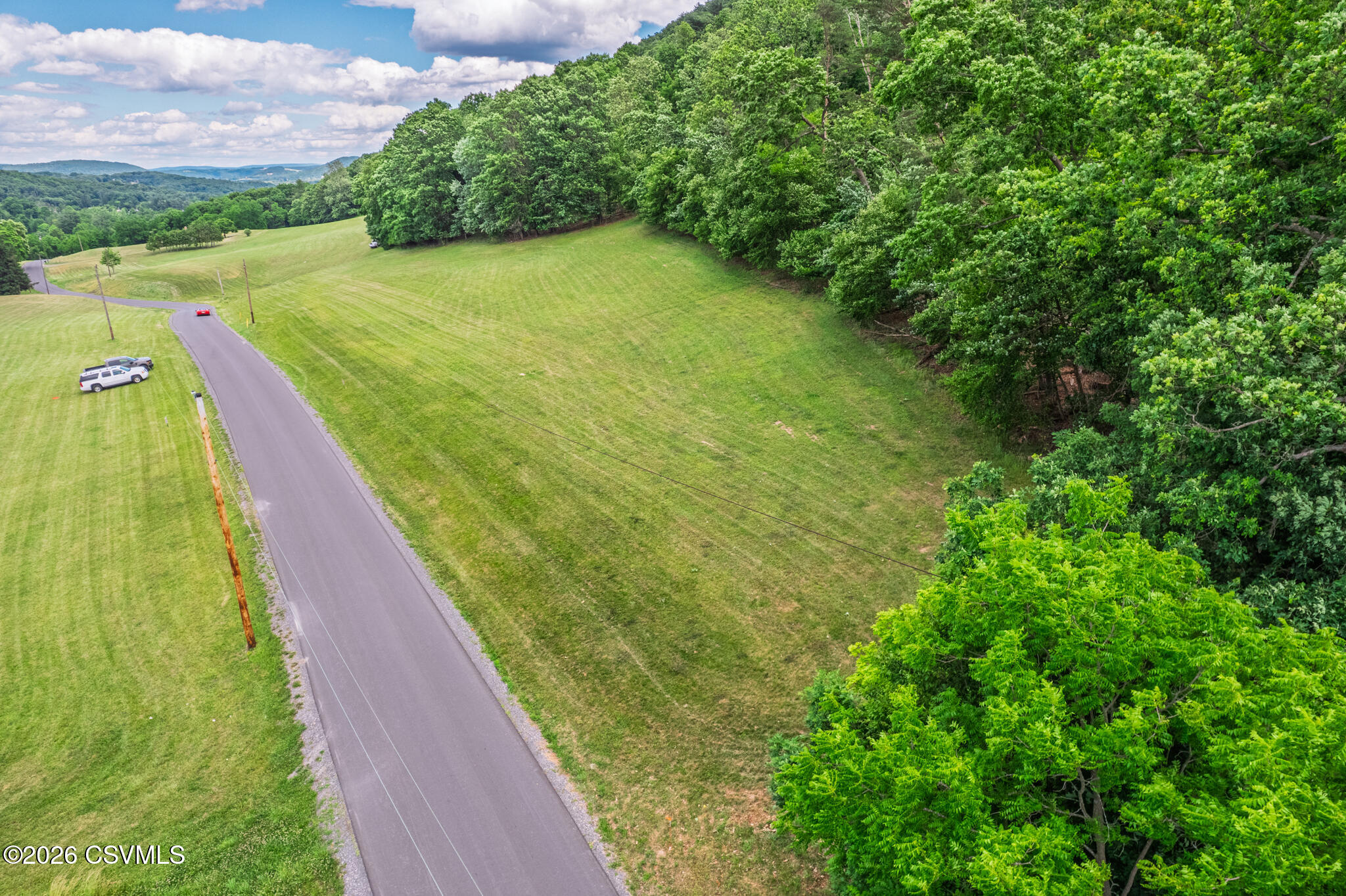 Lot # Old Reading Road Sunbury, PA 17801 - Photo 1 of 8 a view of a lake with a yard