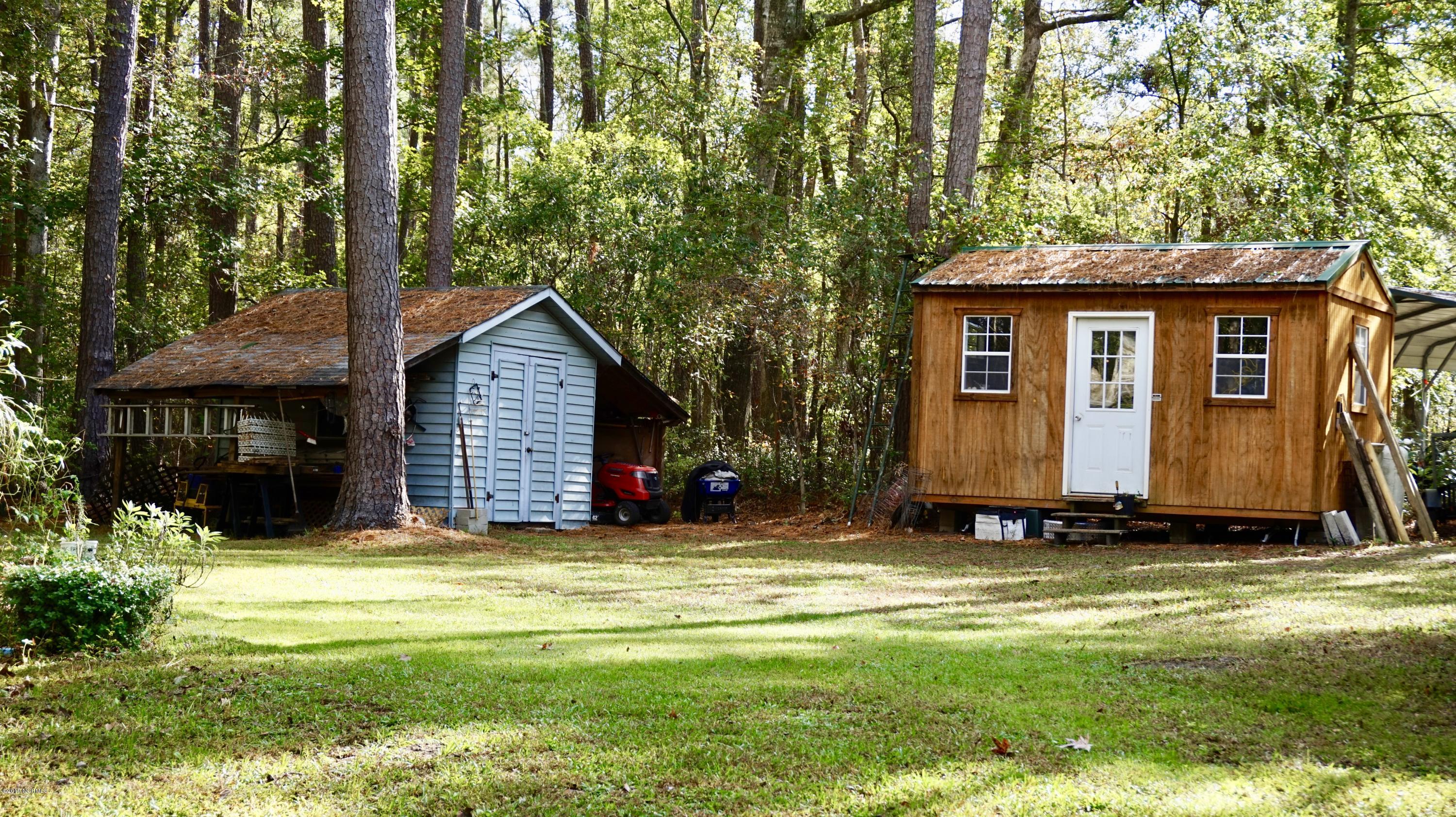 410 Sand Ridge Road New Bern, NC 28560 - Photo 17 of 20 Storage Shed with Lean-To & Workshop with Electrics