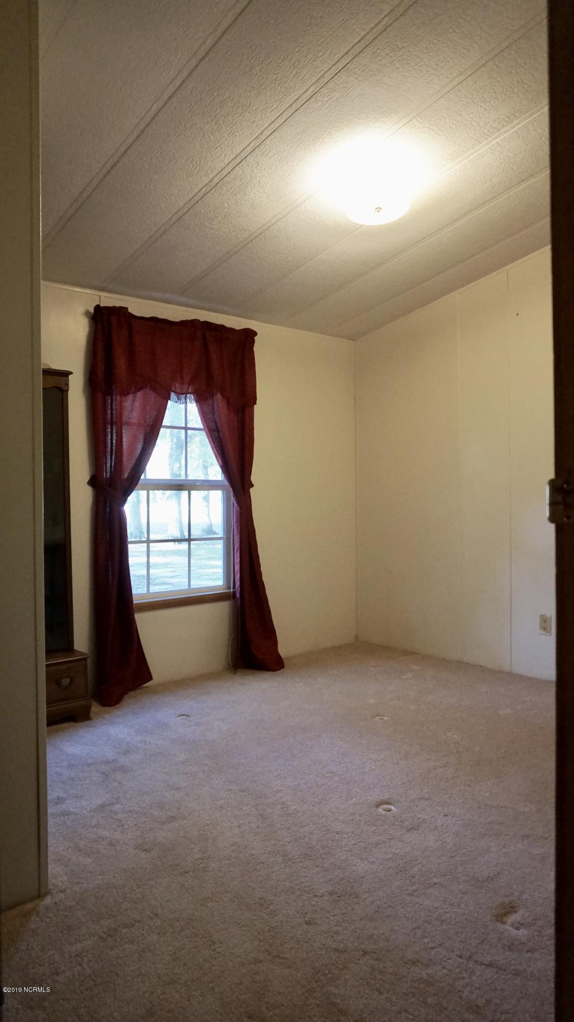 410 Sand Ridge Road New Bern, NC 28560 - Photo 8 of 20 Second Bedroom - on the front of the house