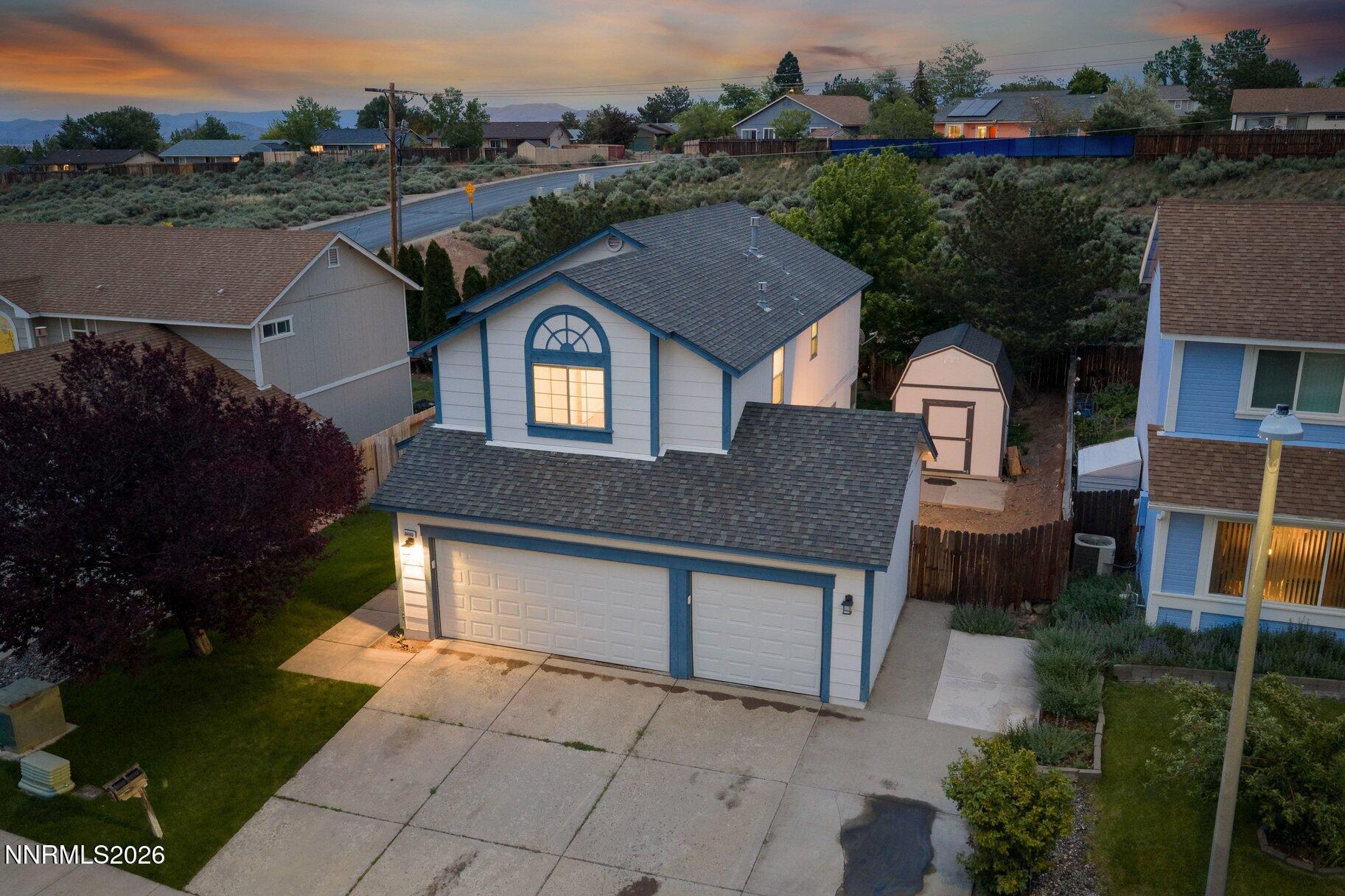 8486 Piper Place Reno, NV 89506 - Photo 71 of 80 an aerial view of a house with a yard