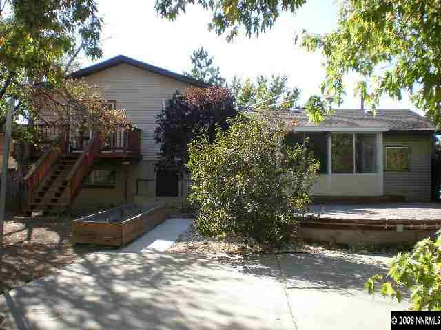 3285 Kings Row Reno, NV 89503 - Photo 1 of 7 a view of a house with backyard