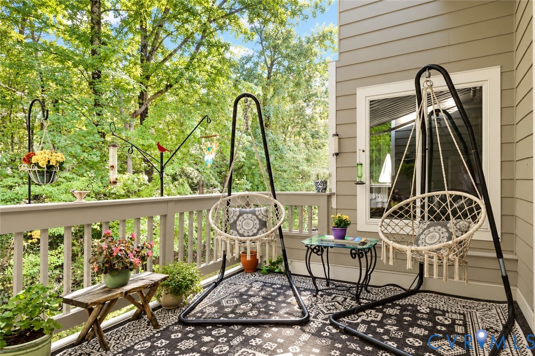 3131 Stony Point Road, Unit B Richmond, VA 23235 - Photo 31 of 65 Exterior deck with wood-finish railing, featuring