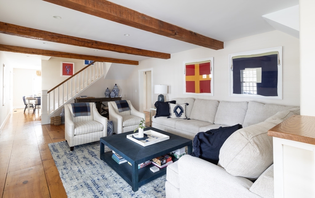 10 Lyon Street Nantucket, MA 02554 - Photo 6 of 23 a living room with furniture and wooden floor