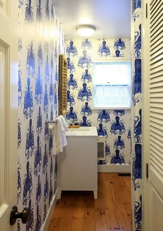 a view of a room with lots of different colored cloths