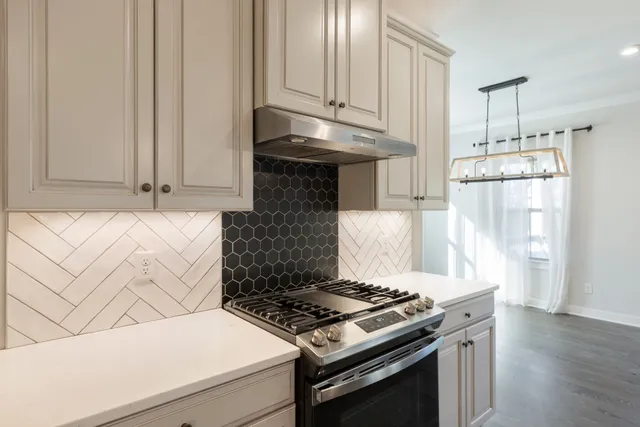 a bathroom with double sink and a mirror
