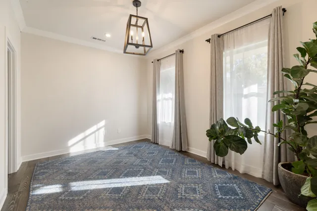 a bathroom with a shower and a glass door