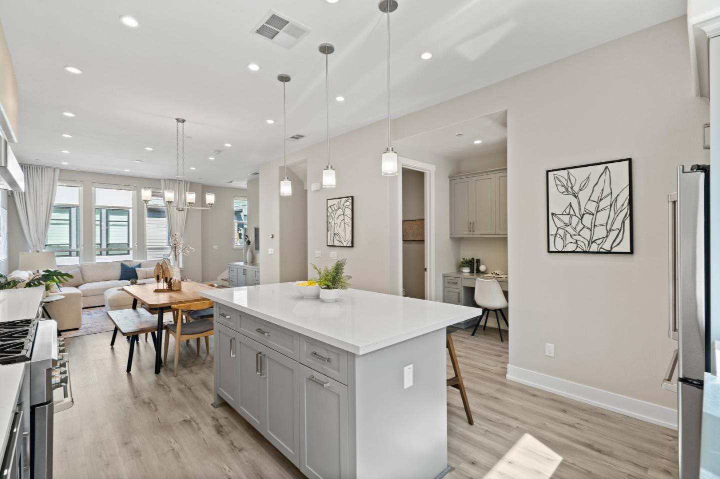 653 Agave Terrace Sunnyvale, CA 94086 - Photo 18 of 44 a large white kitchen with a large window