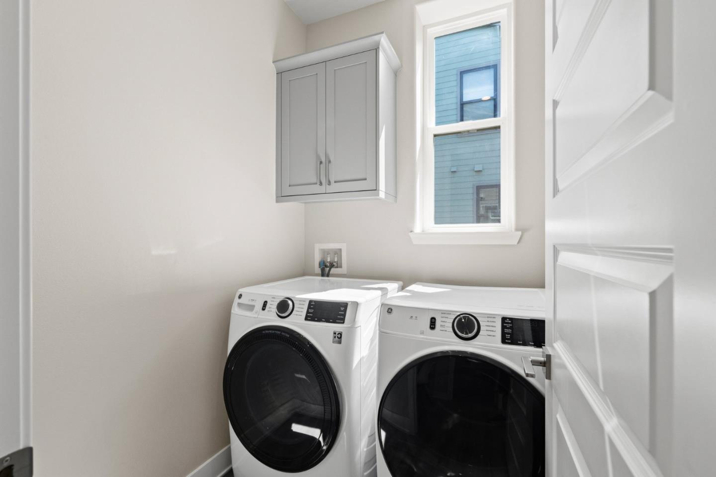 653 Agave Terrace Sunnyvale, CA 94086 - Photo 22 of 44 a utility room with dryer and washer