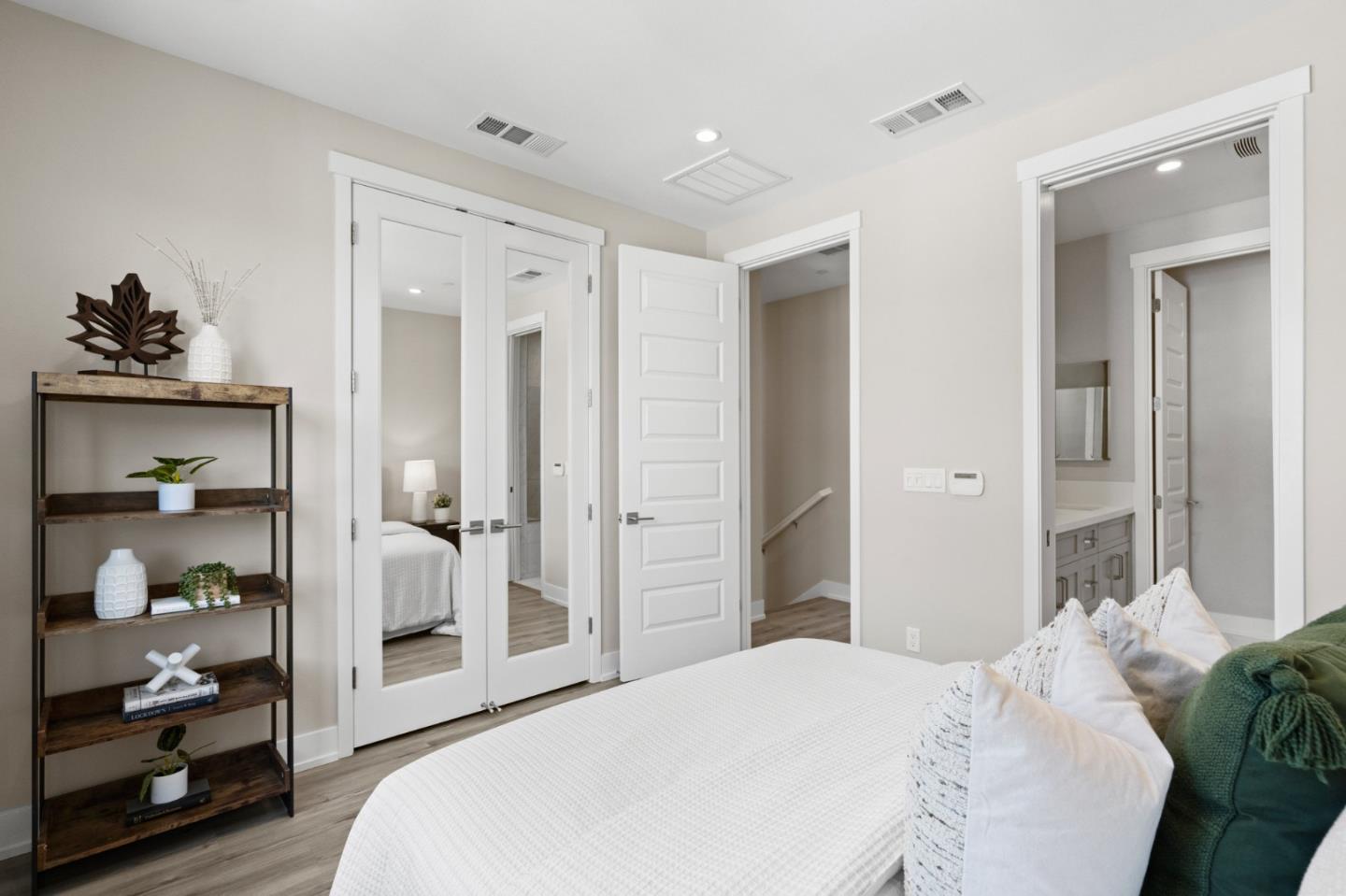 653 Agave Terrace Sunnyvale, CA 94086 - Photo 25 of 44 a bedroom with a bed and a window