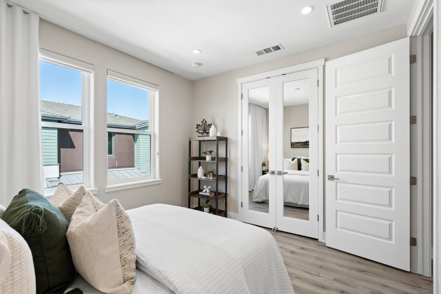 653 Agave Terrace Sunnyvale, CA 94086 - Photo 26 of 44 a bed room with a bed and a window