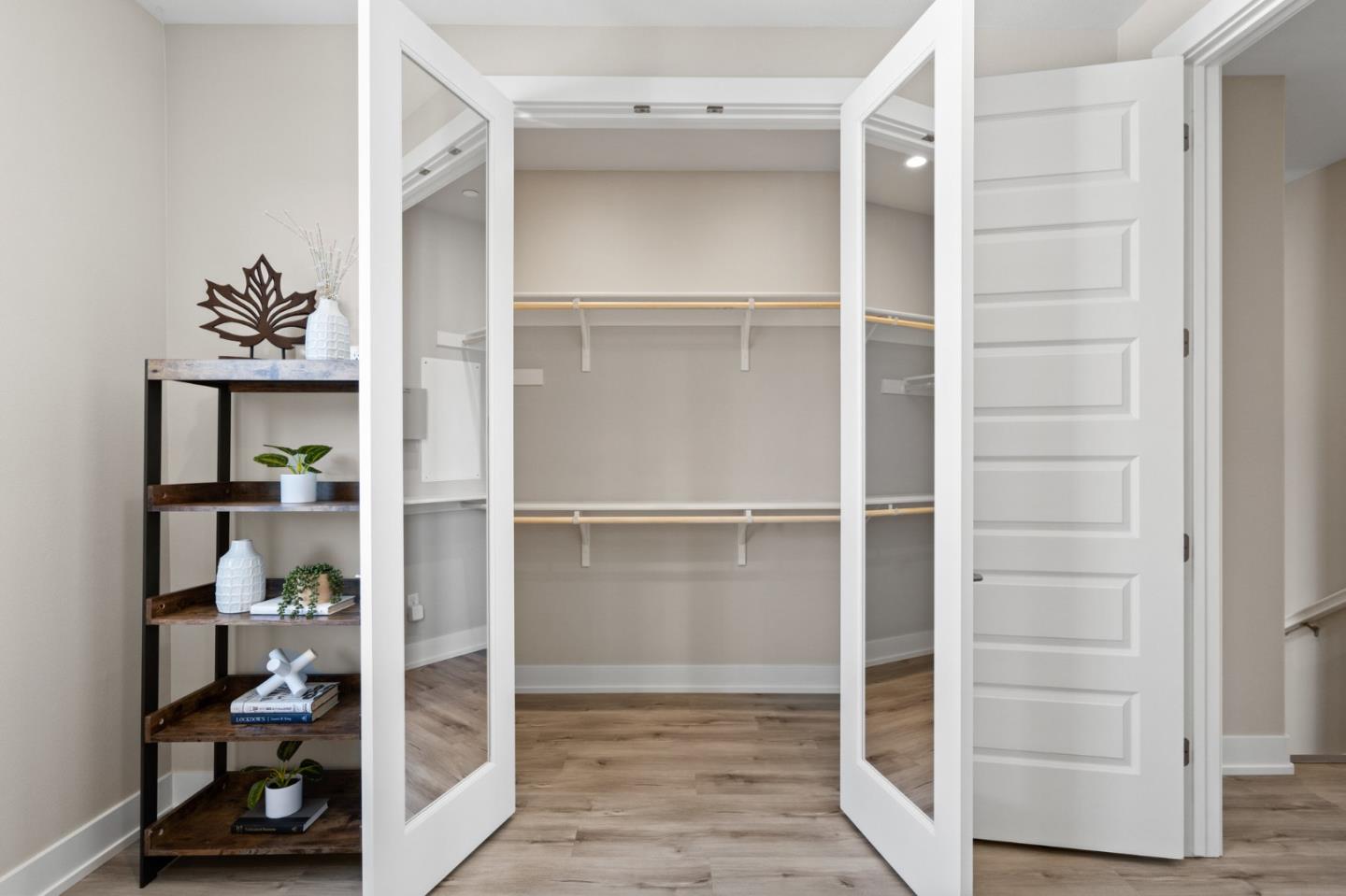 653 Agave Terrace Sunnyvale, CA 94086 - Photo 27 of 44 a view of walk in closet with empty racks