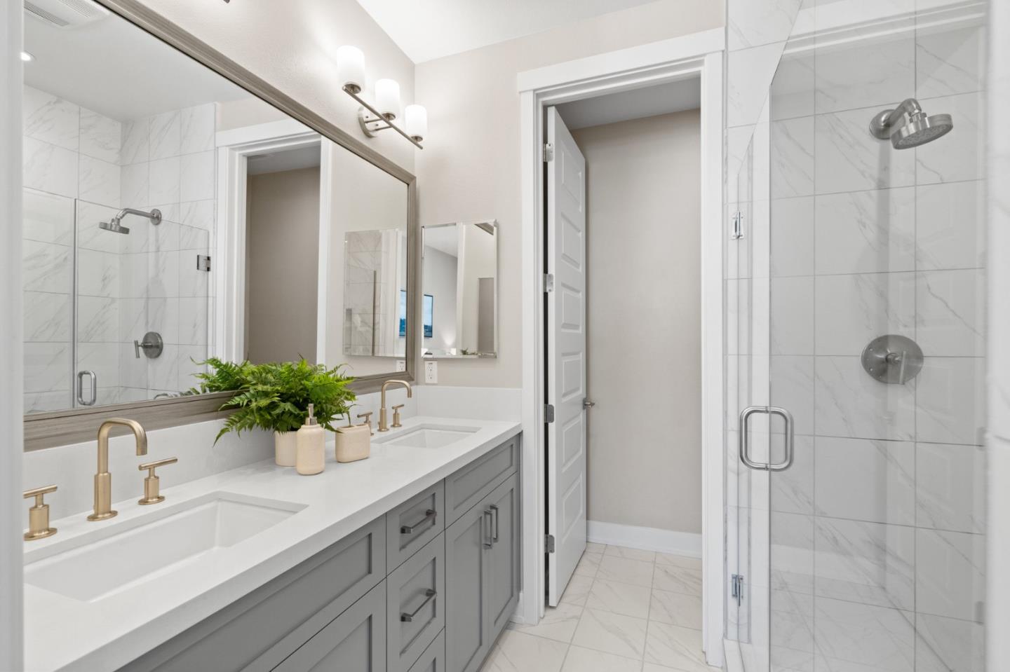 653 Agave Terrace Sunnyvale, CA 94086 - Photo 28 of 44 a bathroom with a double vanity sink mirror and shower