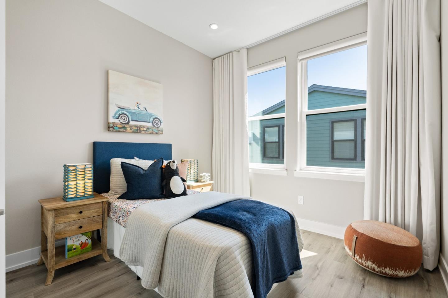 653 Agave Terrace Sunnyvale, CA 94086 - Photo 30 of 44 a bedroom with a bed and a window