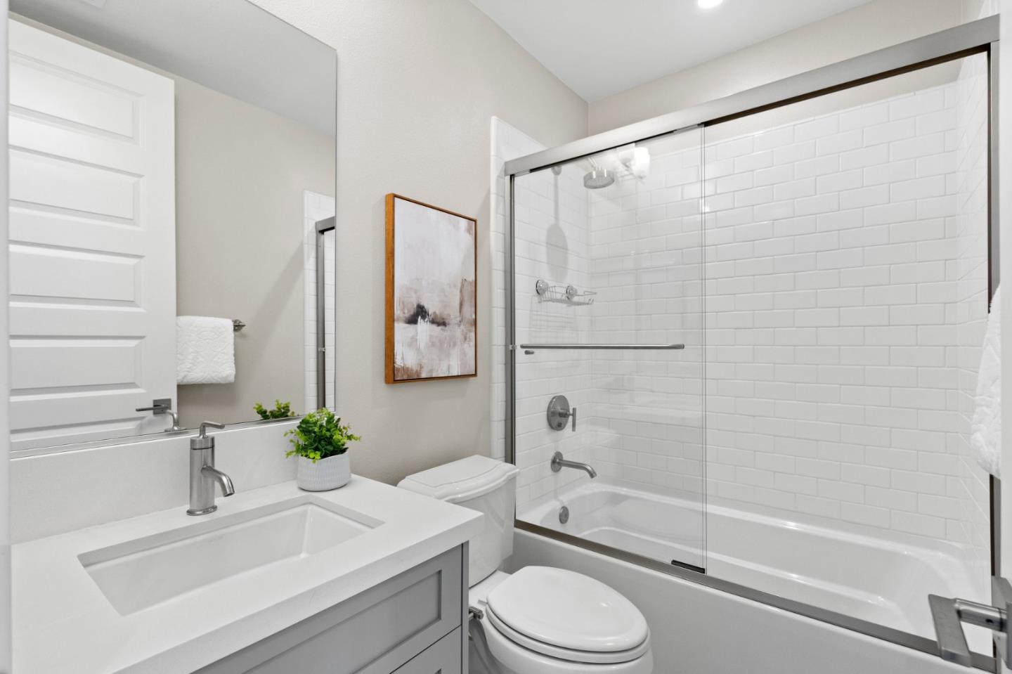 653 Agave Terrace Sunnyvale, CA 94086 - Photo 34 of 44 a bathroom with a sink toilet and shower