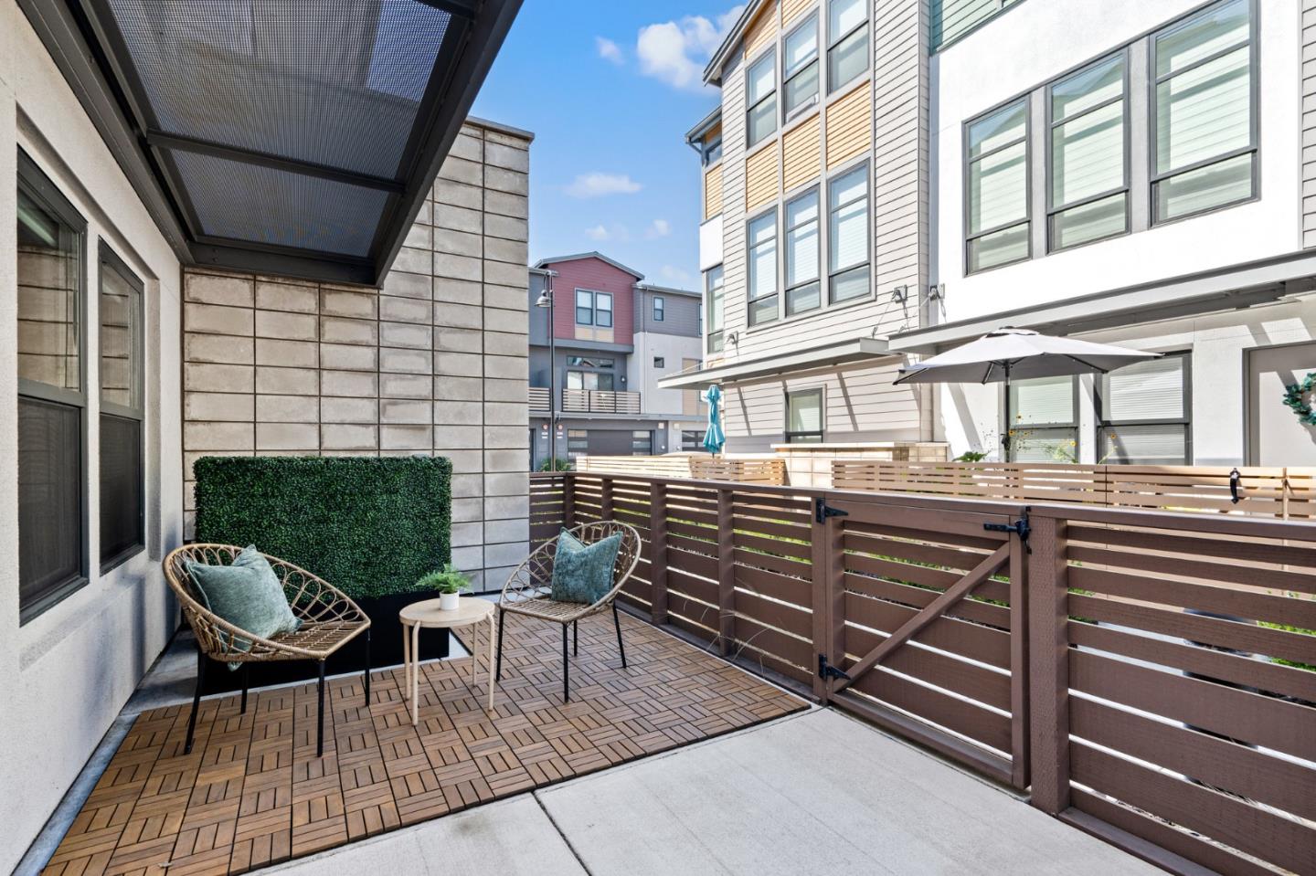 653 Agave Terrace Sunnyvale, CA 94086 - Photo 6 of 44 a view of a building with outdoor seating