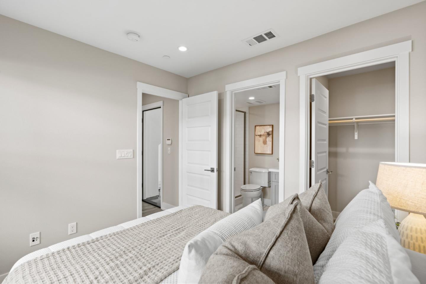 653 Agave Terrace Sunnyvale, CA 94086 - Photo 9 of 44 a bedroom with a bed and closet