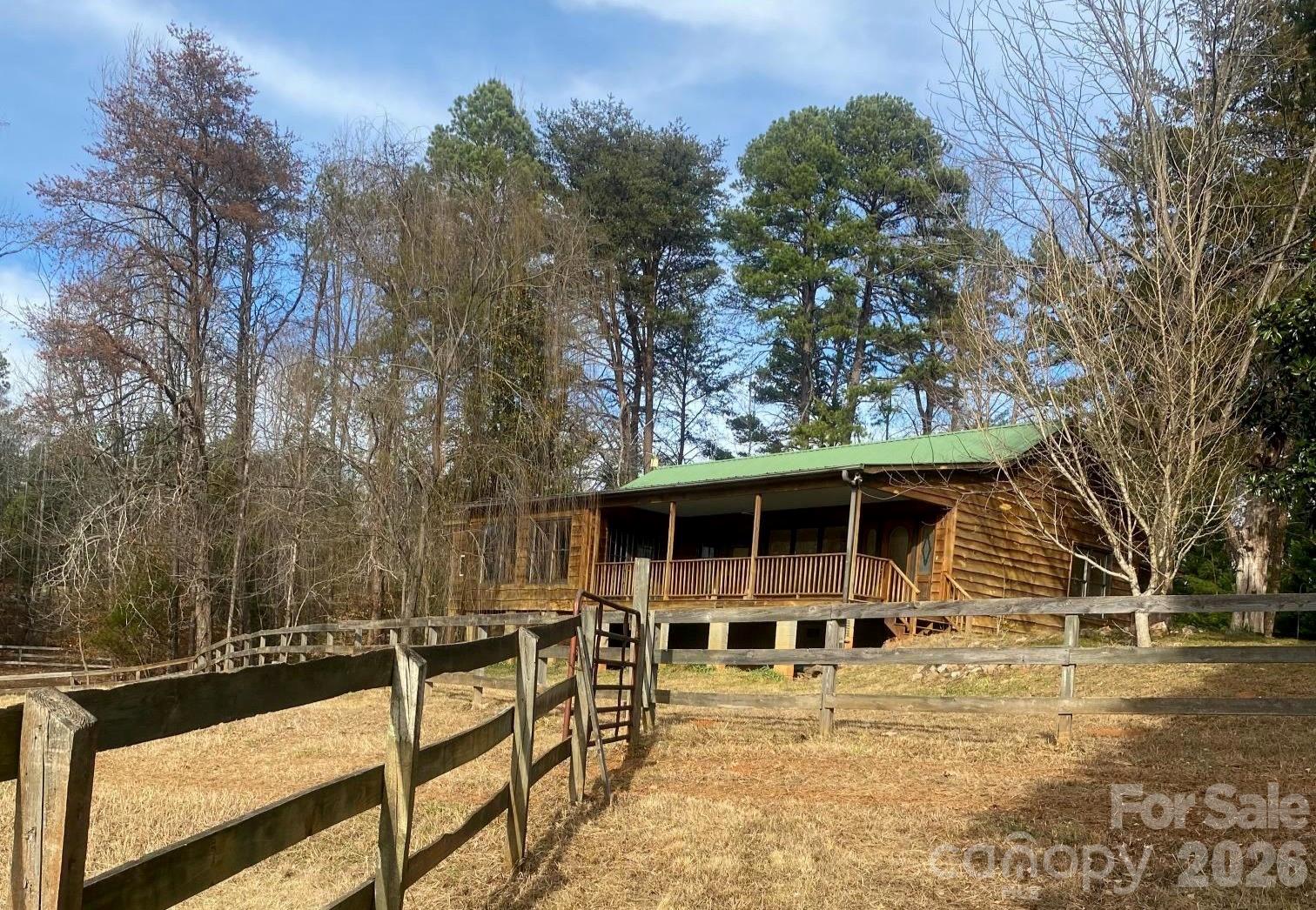 3205 Collinsville Road Columbus, NC 28722 - Photo 3 of 48 a view of a house with a backyard
