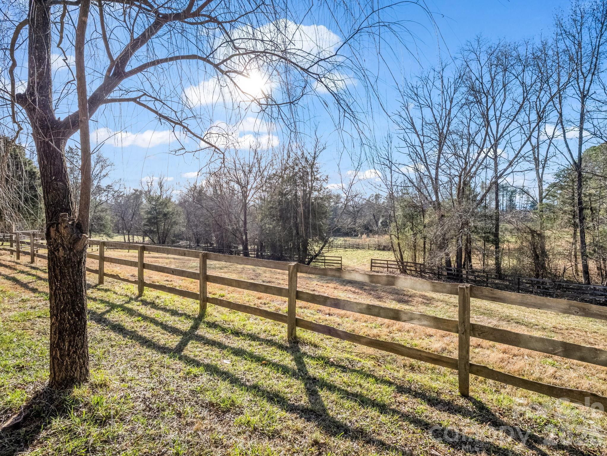 3205 Collinsville Road Columbus, NC 28722 - Photo 38 of 48 a view of a yard with wooden fence