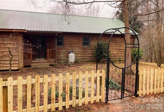 a front view of a house with garage