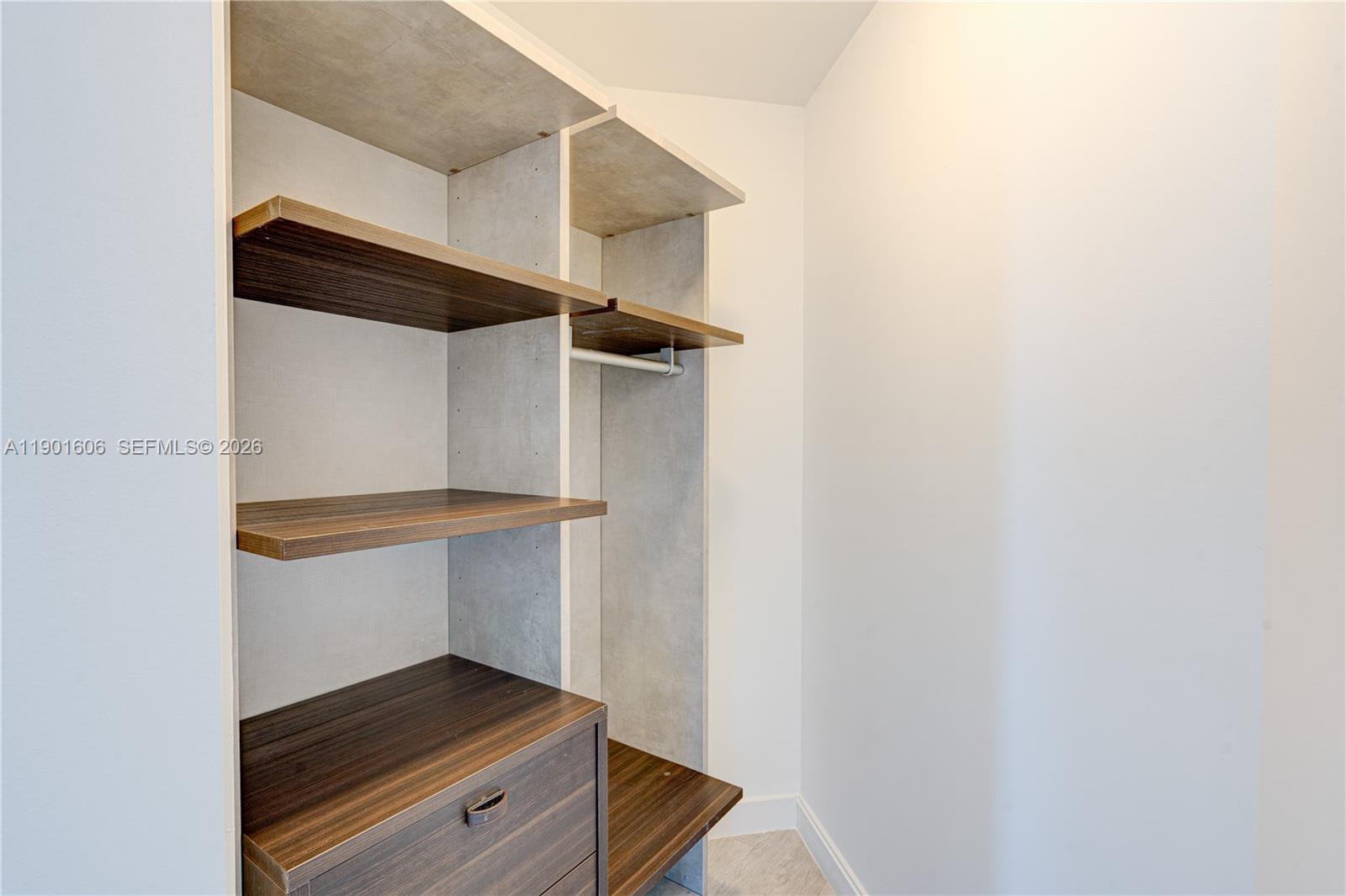 45 Southwest 9th Street, Unit 2408 Miami, FL 33130 - Photo 17 of 37 a small space with wooden floor