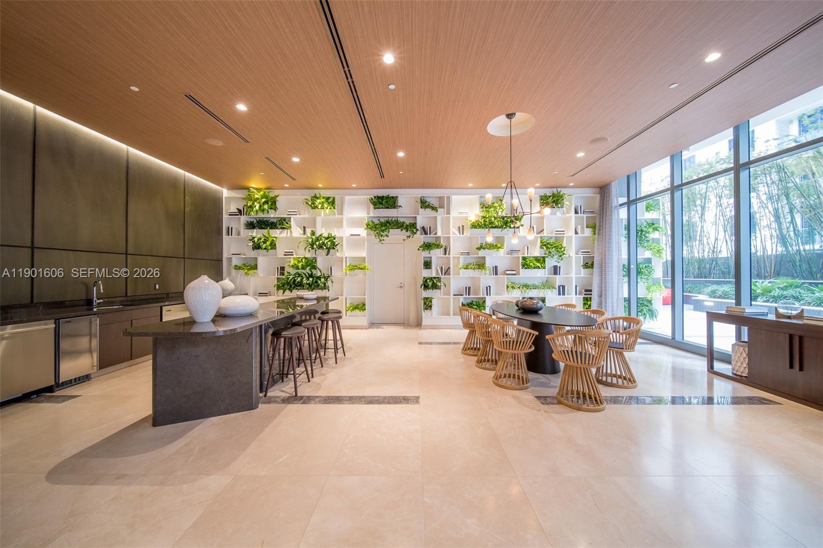 45 Southwest 9th Street, Unit 2408 Miami, FL 33130 - Photo 33 of 37 a living room with furniture and a large window