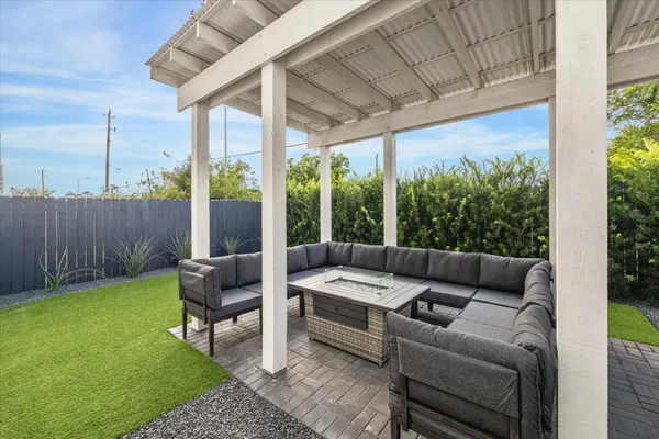 a outdoor living space with furniture and garden view