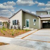 a front view of a house with a entertaining space