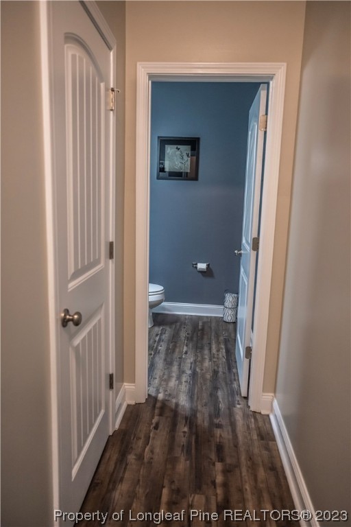 96 Eaker Drive Cameron, NC 28326 - Photo 14 of 41 a view of a room with wooden floor and a hallway