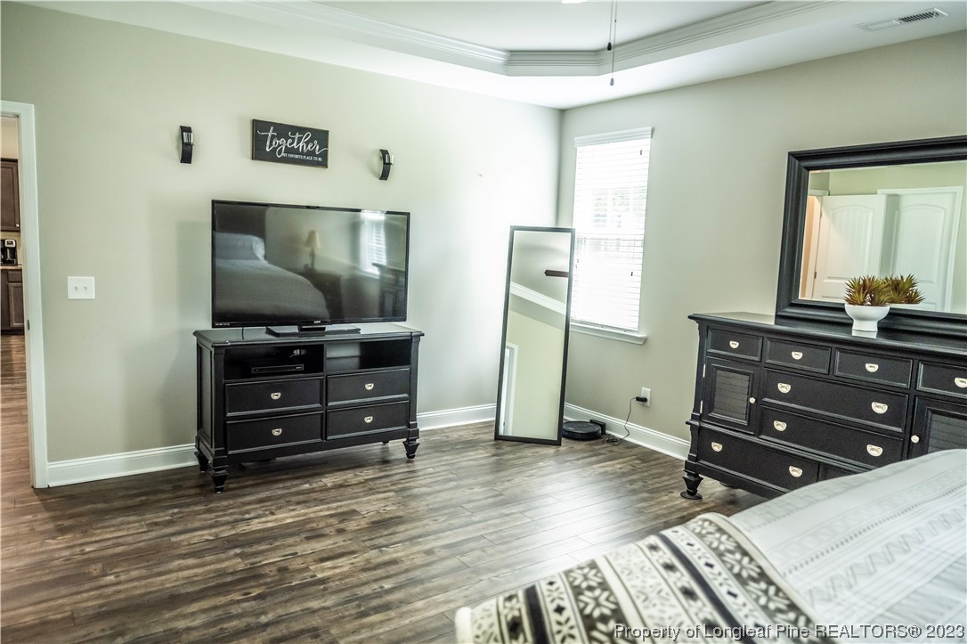 96 Eaker Drive Cameron, NC 28326 - Photo 19 of 41 a room with a dresser and a mirror