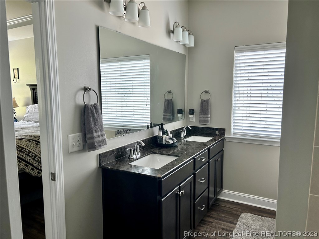 96 Eaker Drive Cameron, NC 28326 - Photo 20 of 41 a kitchen with a sink and a window