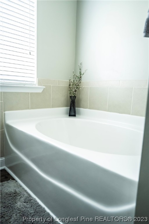 96 Eaker Drive Cameron, NC 28326 - Photo 21 of 41 a bathroom with a bathtub