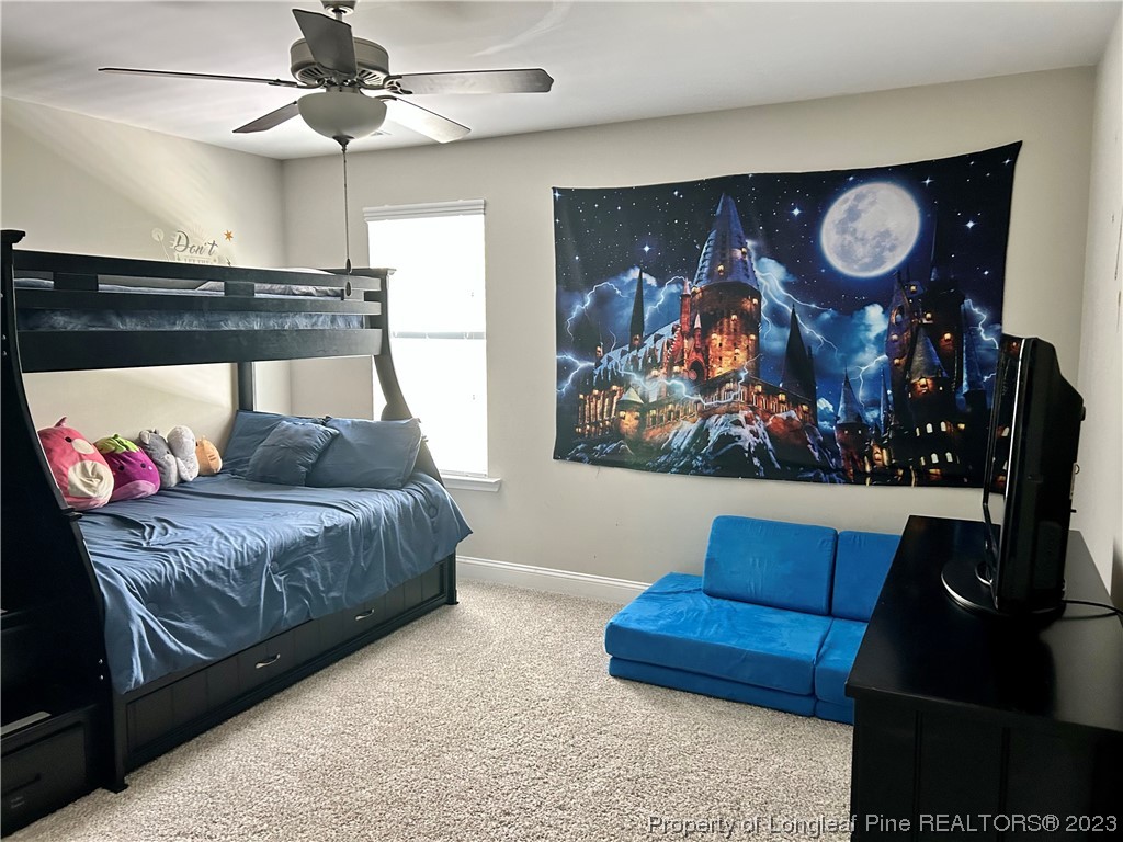 96 Eaker Drive Cameron, NC 28326 - Photo 28 of 41 a living room with furniture and wooden floor