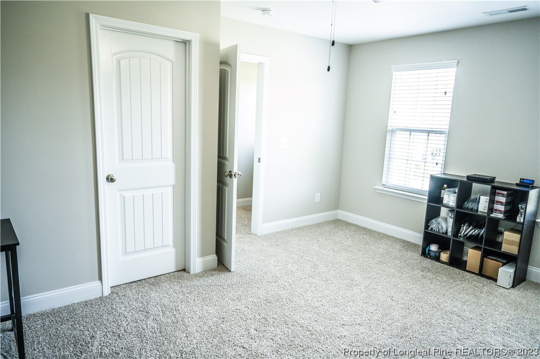 96 Eaker Drive Cameron, NC 28326 - Photo 31 of 41 an empty room with windows