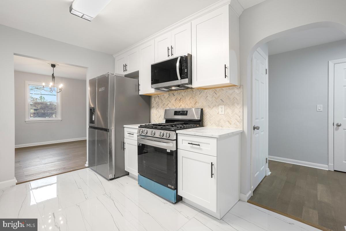 705 Woodsdale Road Catonsville, MD 21228 - Photo 14 of 45 White Wood Cabinets