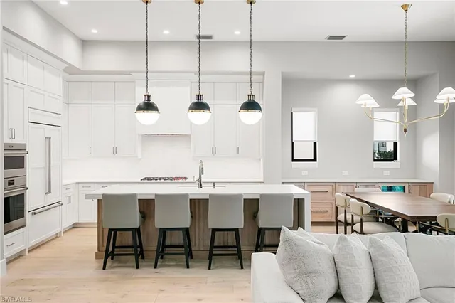 a spacious bedroom with a large bed and a window