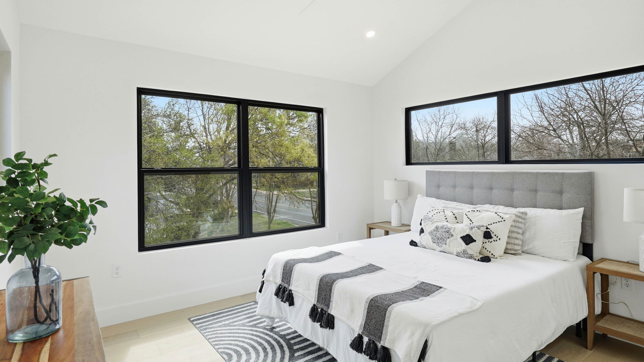 300 Lightsey Road, Unit 2 Austin, TX 78704 - Photo 19 of 28 Bedroom with light wood-type flooring, vaulted ceiling, and recessed lighting