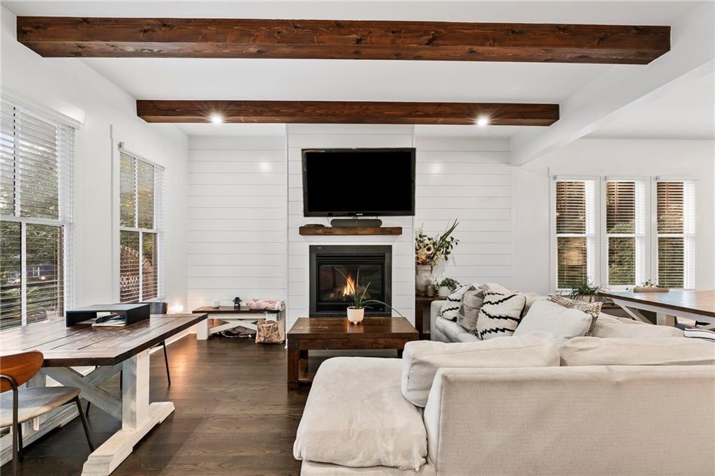 1771 Derry Avenue Southwest Atlanta, GA 30310 - Photo 2 of 45 a living room with fireplace furniture and a flat screen tv