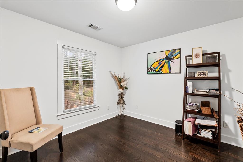 1771 Derry Avenue Southwest Atlanta, GA 30310 - Photo 22 of 45 a view of room with toys and wooden floor
