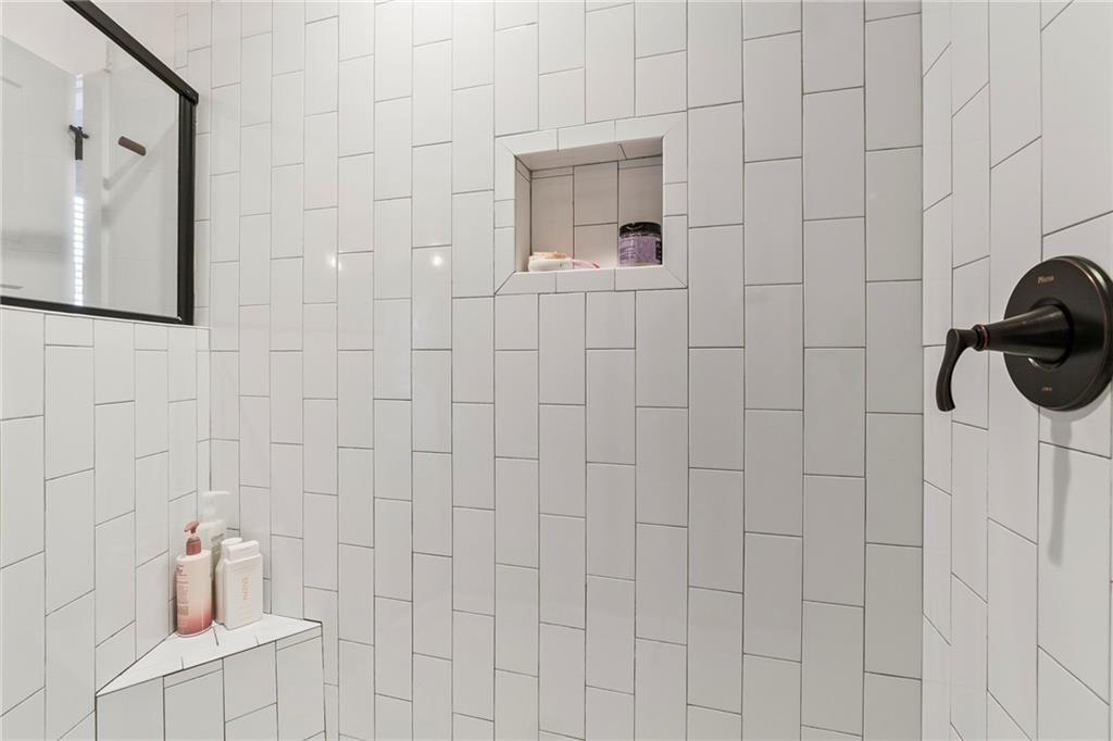 1771 Derry Avenue Southwest Atlanta, GA 30310 - Photo 30 of 45 a bathroom with a shower
